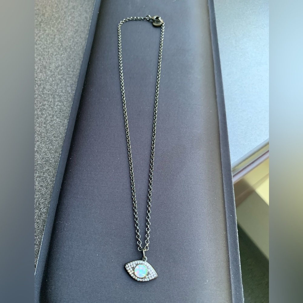 Raw & Rebellious evil eye necklace- opalescent in the center.